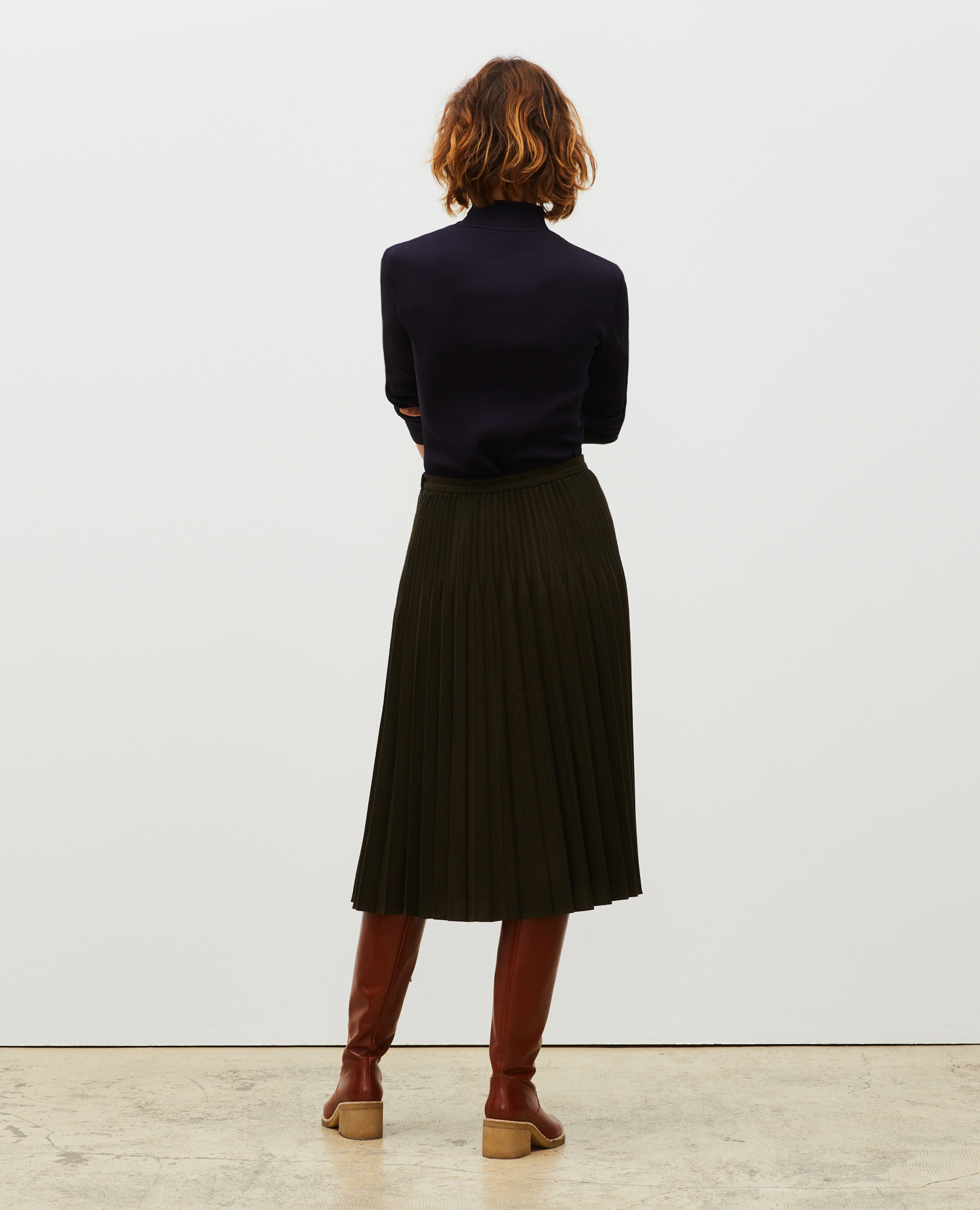 pleated green wool skirt